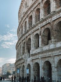 Group of people in front of historical building