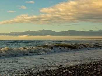 Scenic view of sea against sky during sunset