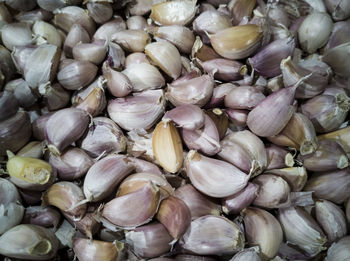 Full frame shot of onions for sale at market