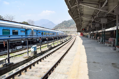 Indian railway train at kathgodam railway station platform during morning time, colourful train