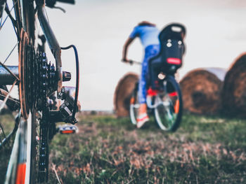 Close-up of bicycle on field