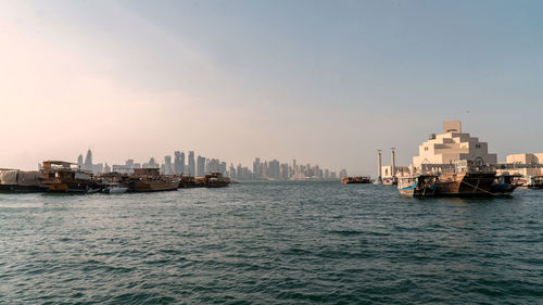 Doha skyline with traditional dhow 