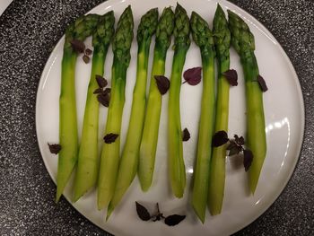 High angle view of vegetables in plate on table