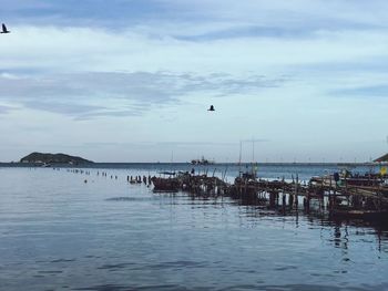 Scenic view of sea against cloudy sky