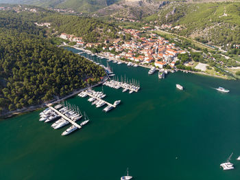 High angle view of boats in city