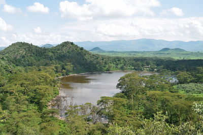 Crater lake against a panoramic mountain landscapes of naivasha, rift valley, kenya