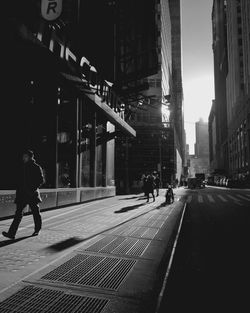 People walking on city street