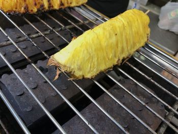 Close-up of meat on barbecue grill