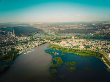 High angle view of river amidst buildings in city