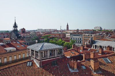 High angle view of buildings in city against clear sky, toulosuse. france