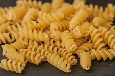 Close-up of yellow and vegetables on table