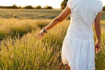 Woman standing in field