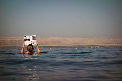 Floating in dead sea