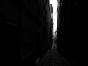 Narrow alley along buildings