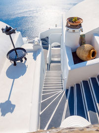 High angle view of chairs at beach