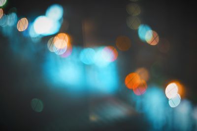 Defocused image of illuminated lights at night