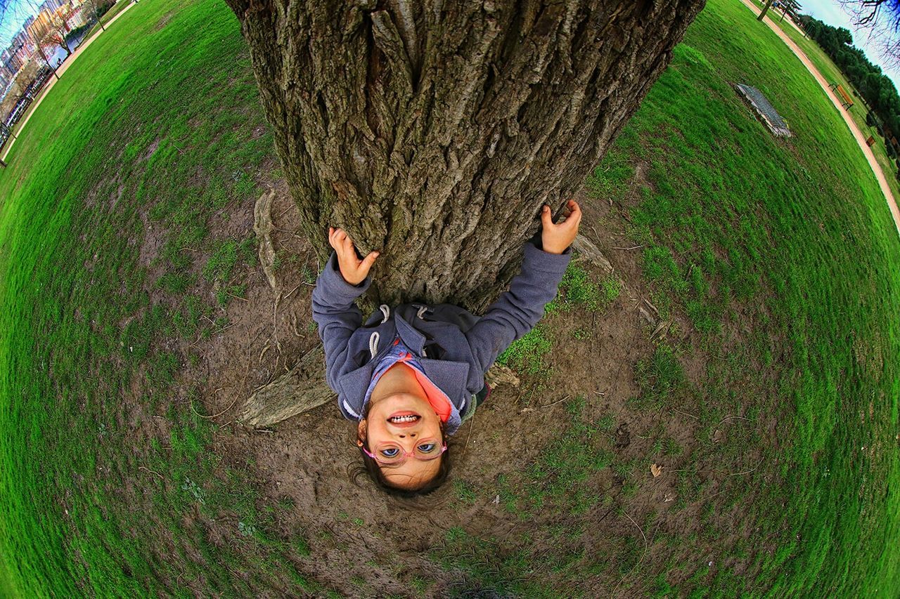 person, lifestyles, leisure activity, grass, casual clothing, childhood, smiling, looking at camera, elementary age, portrait, young adult, happiness, full length, young women, tree, park - man made space, girls, green color