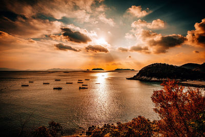 Scenic view of sea against dramatic sky