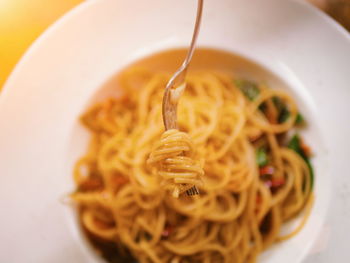 Close-up of noodles in bowl on table