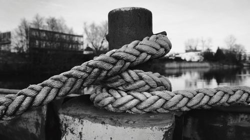 Close-up of rope tied to bollard