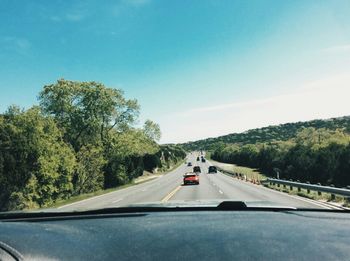 Cars passing on highway