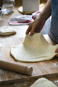 Midsection of person preparing food