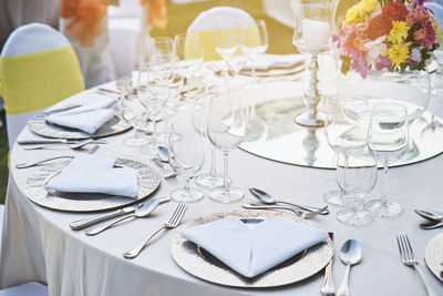 High angle view of place setting on dinning table during wedding ceremony