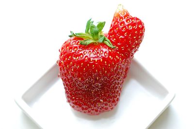 Close-up of strawberry in plate on table