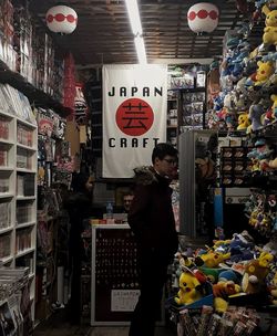 Woman standing in store for sale