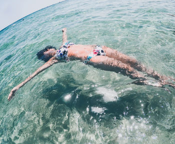 Man swimming in sea