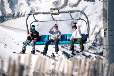 People sitting on snow