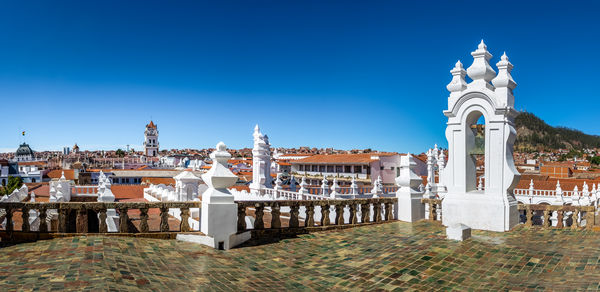 Low angle view of historic building against clear blue sky