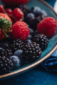 Close-up of strawberries in bowl on table