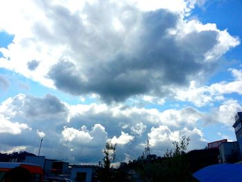 Building against cloudy sky