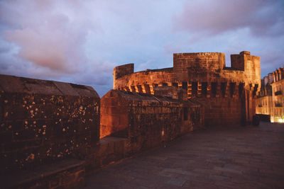 Fort against cloudy sky