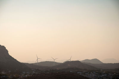 Scenic view of mountains against sky during sunset