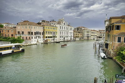 Canal passing through city buildings