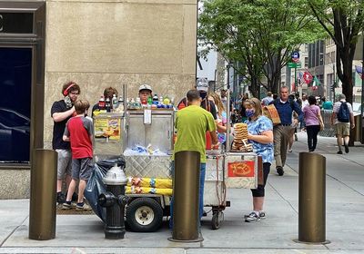 People on street in city