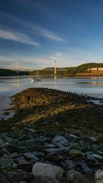 Bridge over river against sky