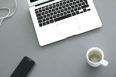 High angle view of coffee cup on table