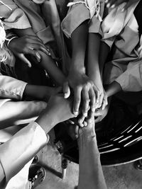 Midsection of woman with hands