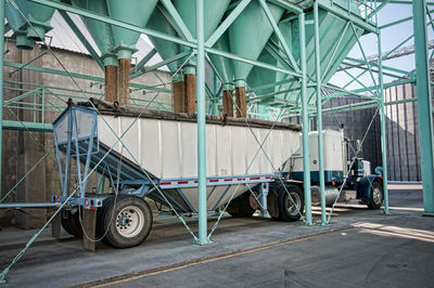 Semi-truck loading rice at mill