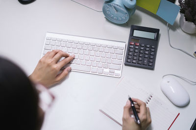 Low section of person working on table
