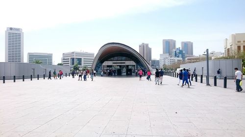 People walking in town square