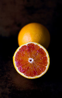 Close-up of apple against black background