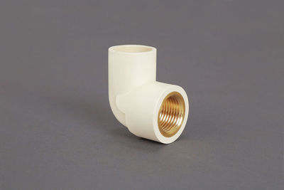 Close-up of coffee cup against white background