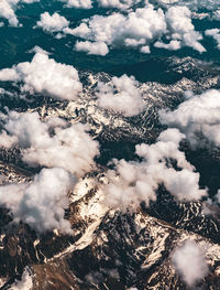 High angle view of snow covered land against sky