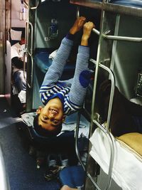 Portrait of smiling boy sitting in bus