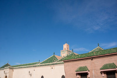 Low angle view of building against blue sky