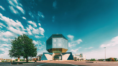 Building against cloudy sky